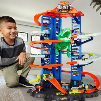 Невообразимый гараж Hot Wheels c тиранозавром GJL14 фото